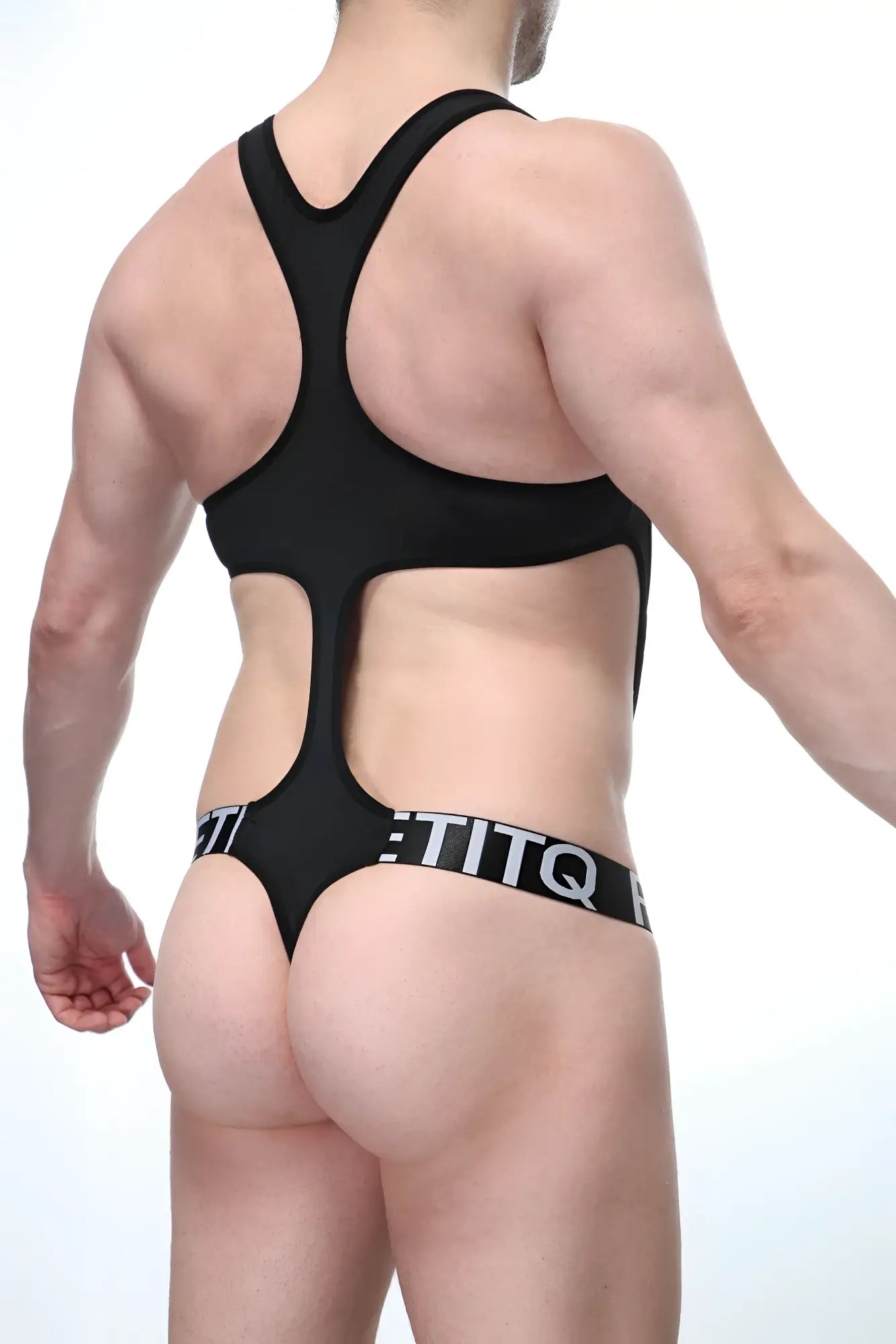 Black titq bodythong oze black bodysuit with racerback design and cutout details shown from the back side