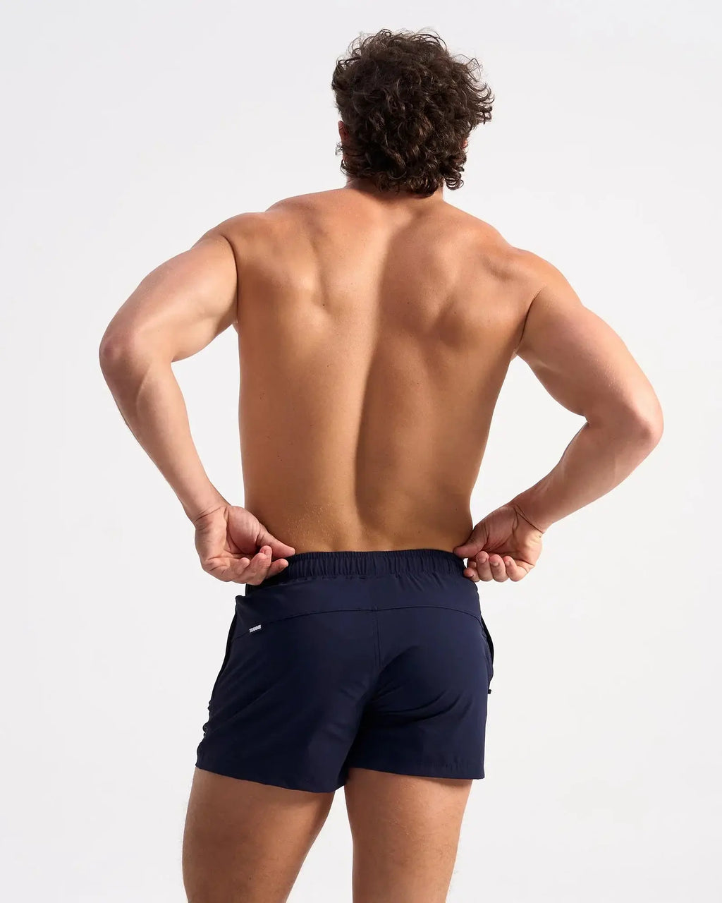 Navy blue bolt 3 inch athletic shorts with elastic waistband and side pockets for running and workouts