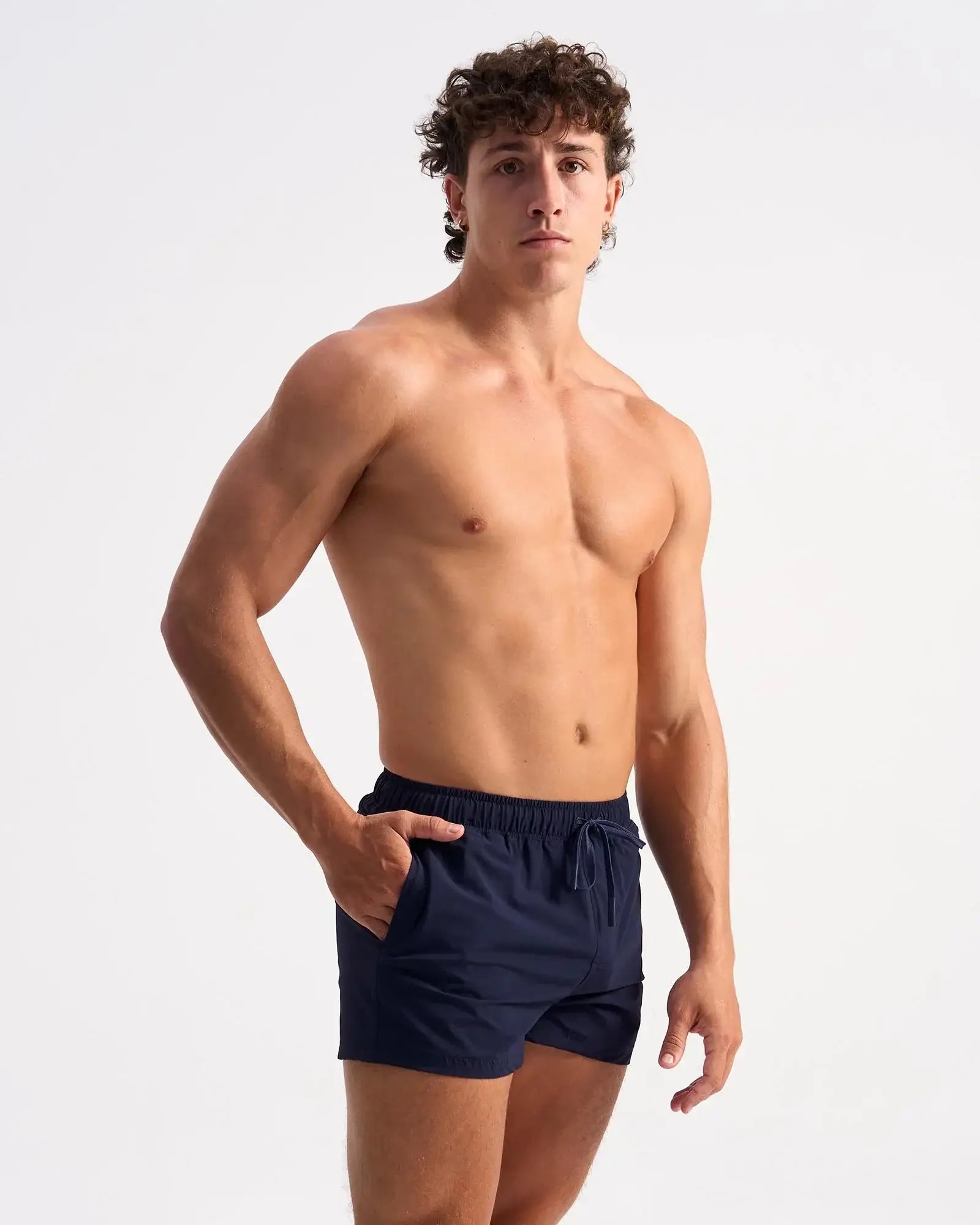 Navy blue bolt 3 short athletic swim trunks with elastic waistband and drawstring for active swimwear use