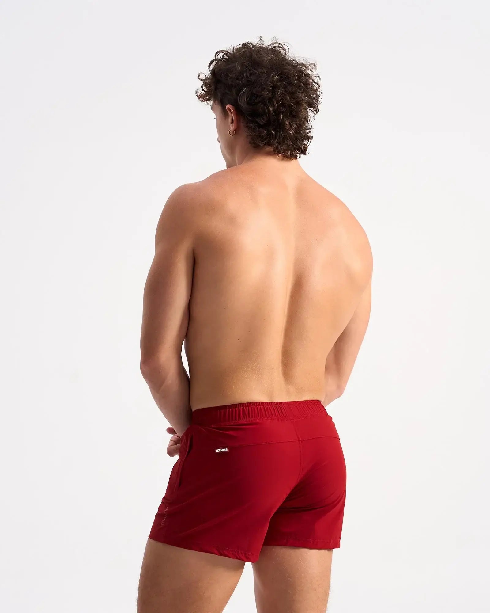 Bolt 3 inch red athletic shorts with snug elastic waistband and small brand logo on the side seam