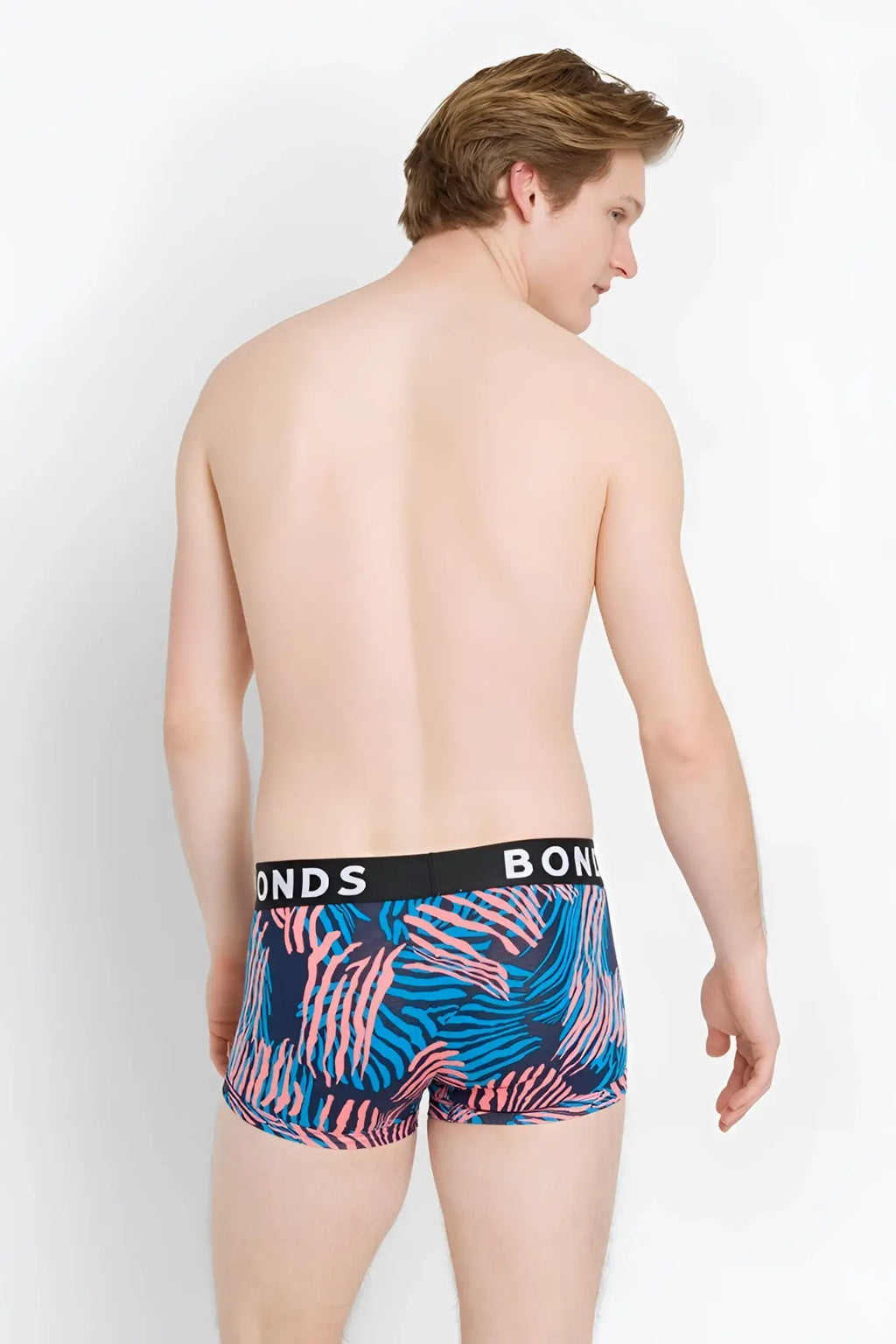 Bonds Fit Trunk boxer brief underwear in blue and pink tropical leaf pattern with black waistband size XS