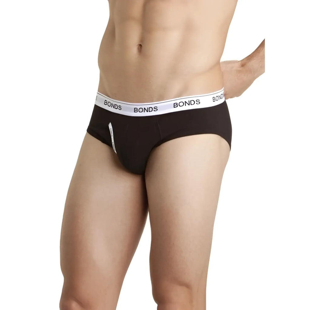 Black bonds guy front briefs underwear in size large with white elastic waistband and black brand lettering