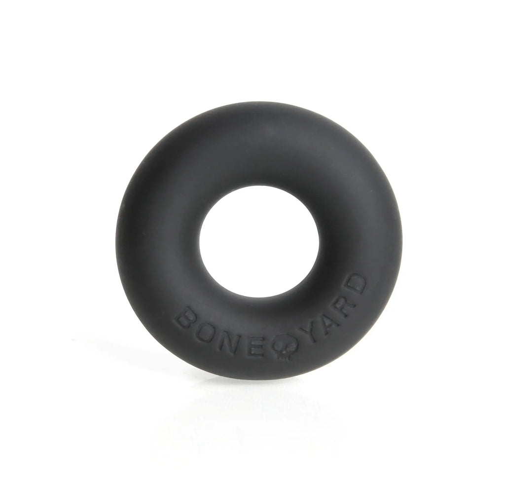 Black silicone ultimate silicone ring embossed with bone yard text on its surface