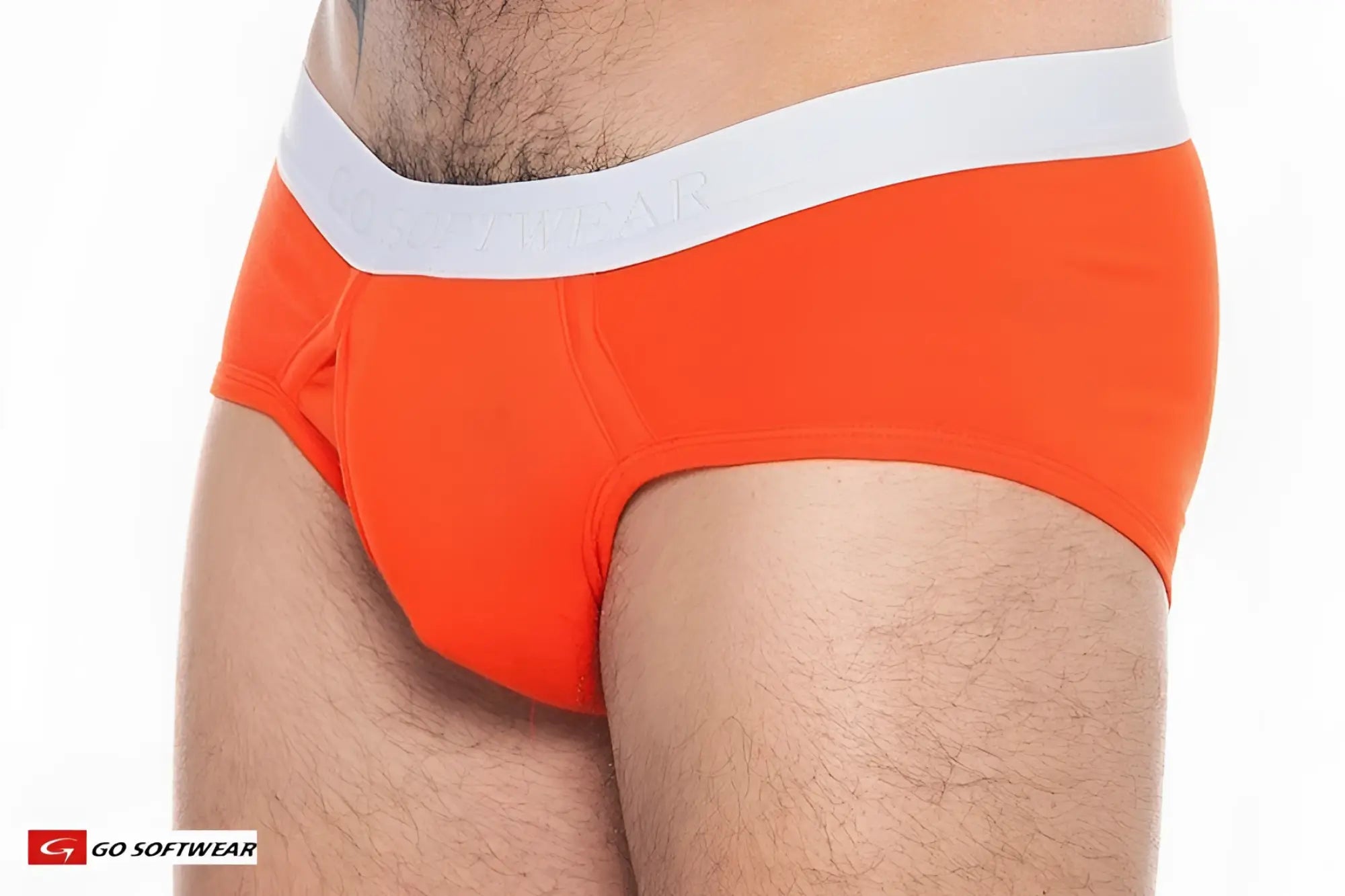 Bright orange boost padded front pouch briefs with white elastic waistband featuring go softwear brand name