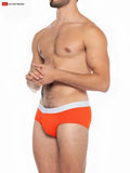 Orange boost padded front pouch brief with white waistband designed for enhanced comfort and support