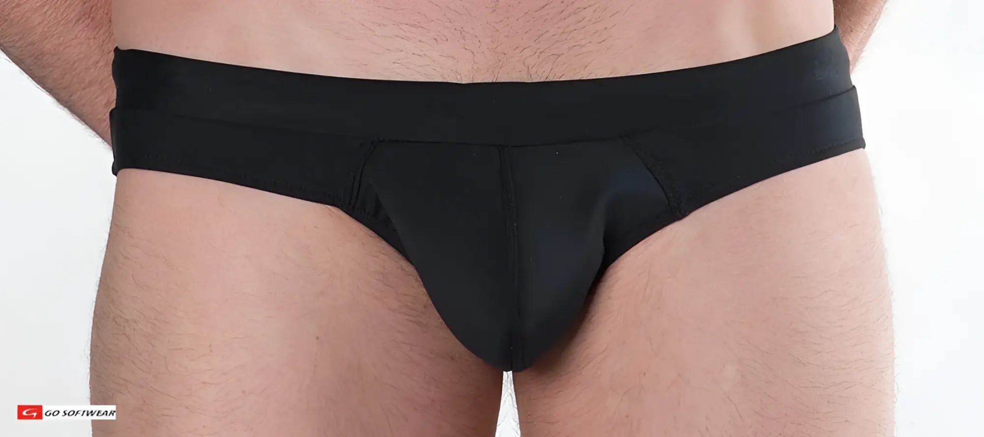 Black Boost swim brief with smooth form-fitting fabric and subtle brand logo on the waistband