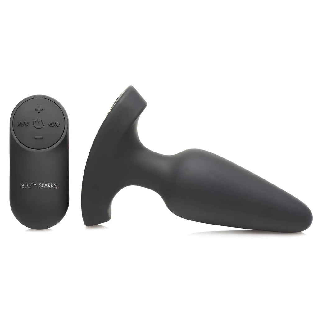 Booty Sparks 28X Laser Heart silicone anal plug and matching remote control in matte black.
