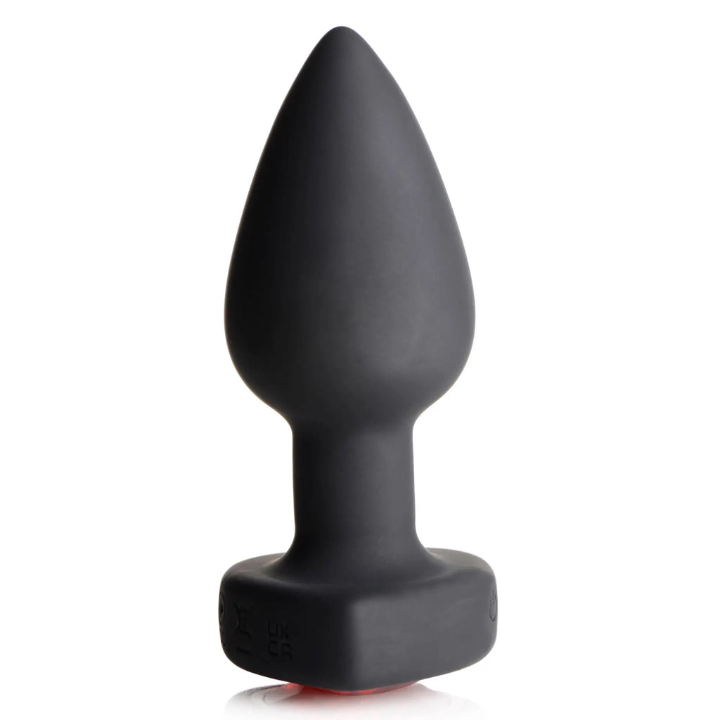 Booty Sparks 28X vibrating silicone anal plug in matte black, featuring a tapered design and a heart-shaped base.