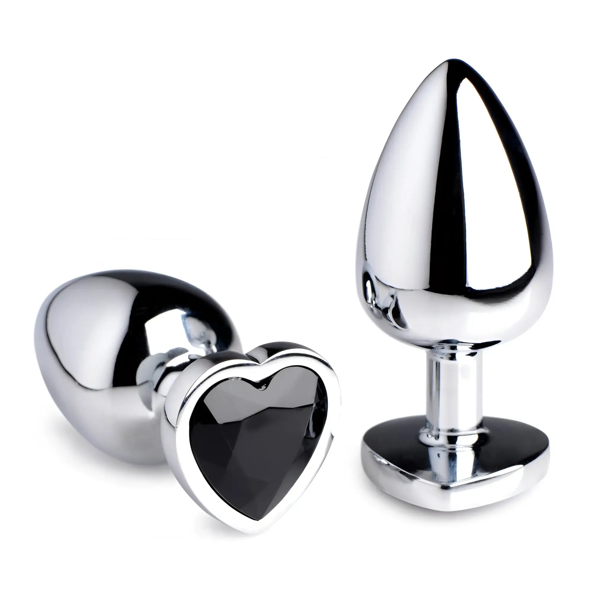 Booty Sparks Black Heart Gem Anal Plug: Two shiny, silver-toned metal plugs featuring a faceted black heart-shaped base.