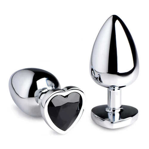 Booty Sparks Black Heart Gem Anal Plug: Two shiny, silver-toned metal plugs featuring a faceted black heart-shaped base.