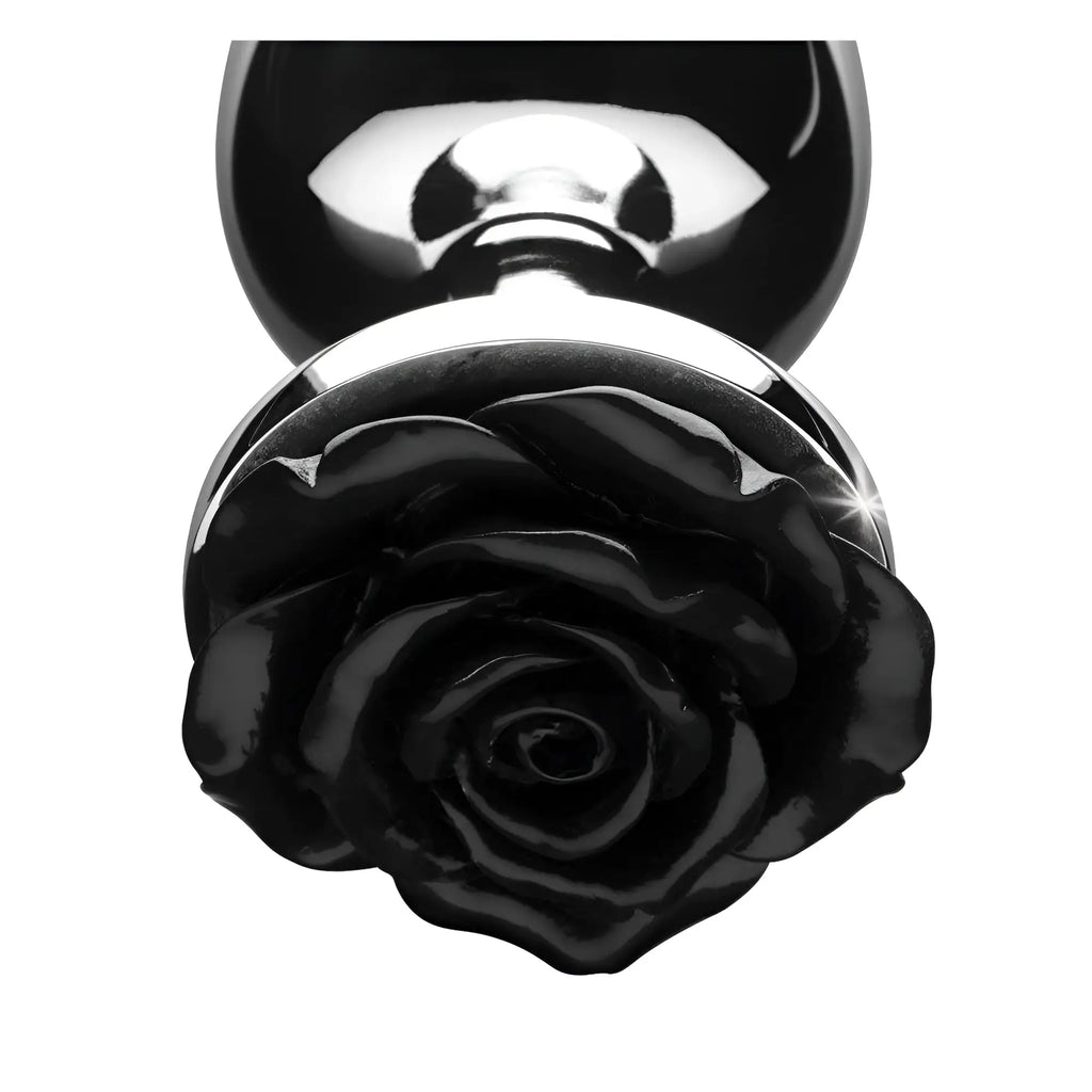 Booty Sparks Black Rose anal plug featuring a glossy black rose base and a polished silver-toned metal stem.