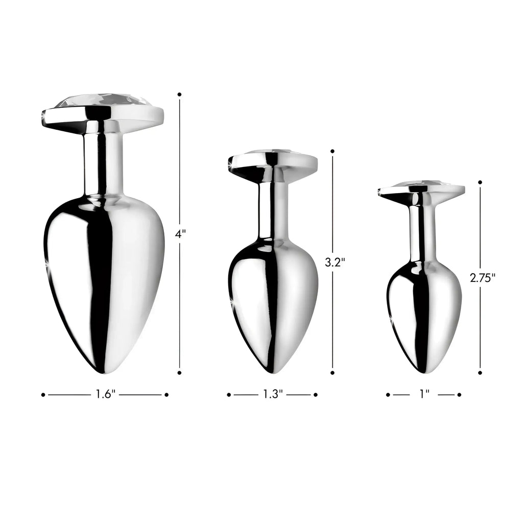 Three silver Booty Sparks anal plugs with clear gem bases, shown in three sizes with dimension labels.