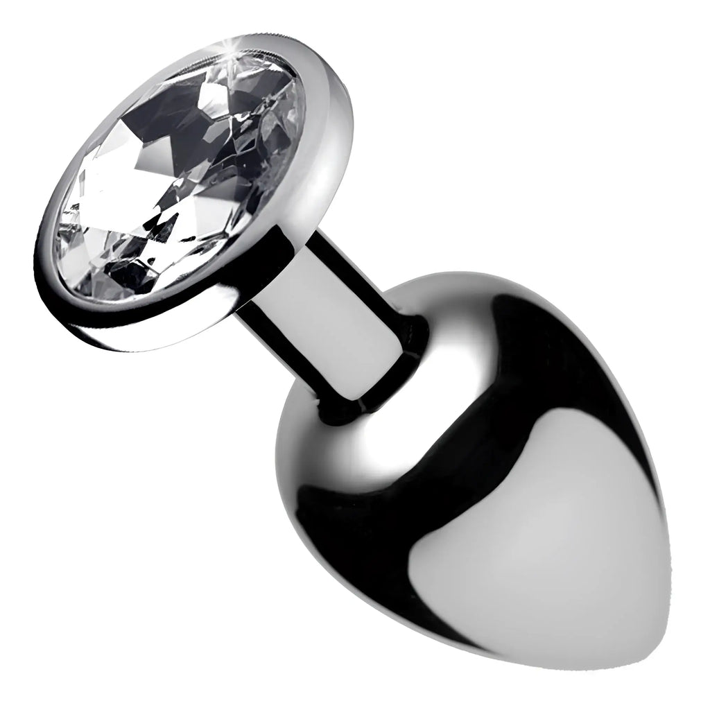 Booty Sparks clear gem anal plug featuring a polished silver-tone metal base with a large, faceted clear crystal jewel.