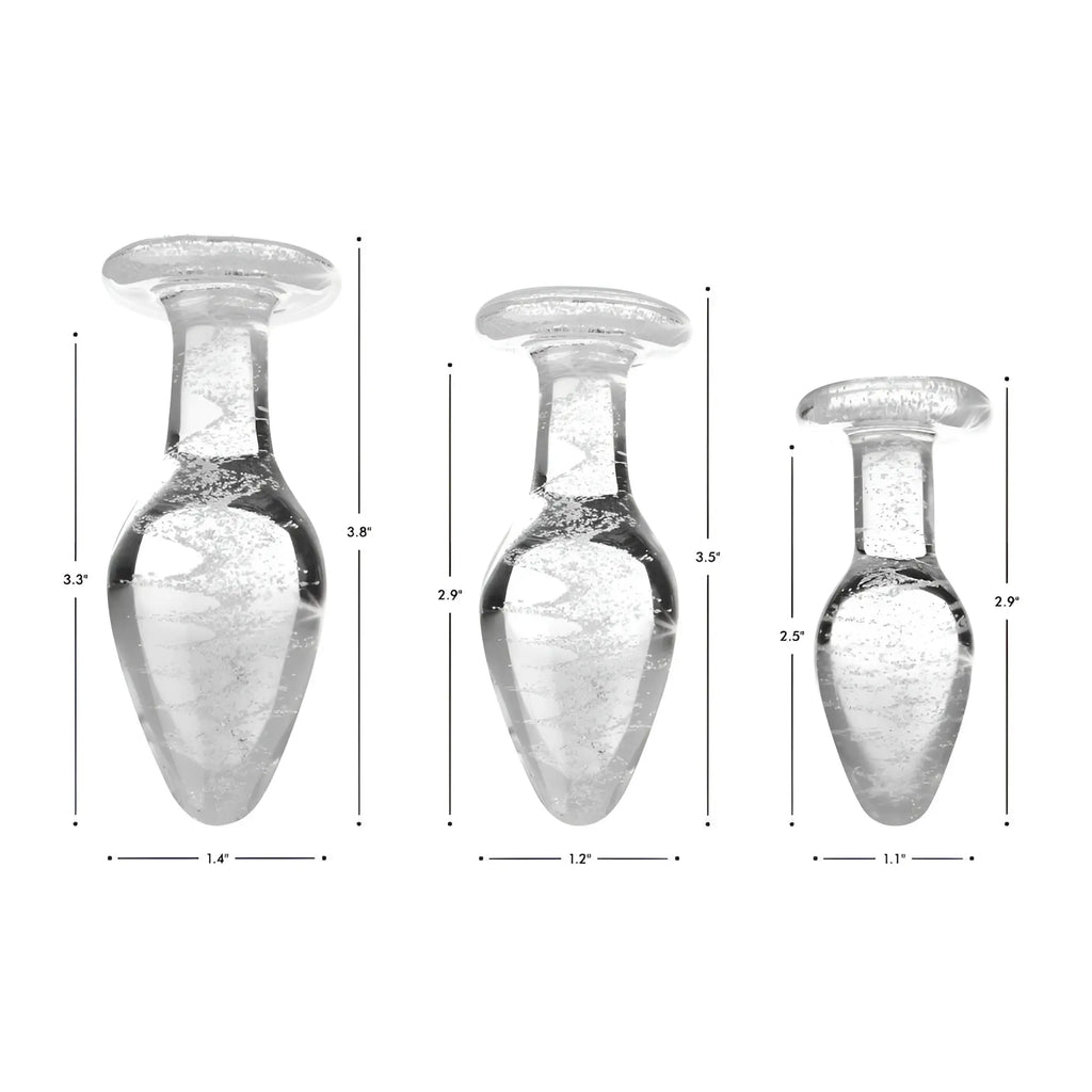 Booty Sparks Glow-in-the-Dark Glass Anal Plugs in three sizes, shown with height and width dimensions on a white background.