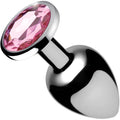 Booty Sparks anal plug with a polished silver-tone metal base and a large, faceted pink gem set in the handle.