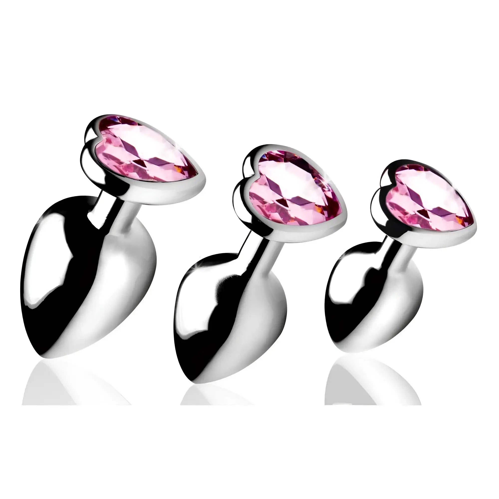 Booty Sparks Pink Heart Anal Plug set: three silver metal plugs with faceted, heart-shaped pink gem bases.
