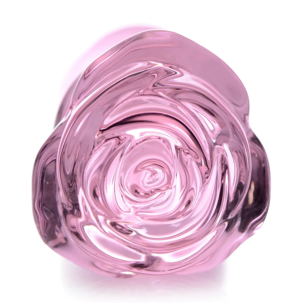 Booty Sparks Pink Rose glass anal plug featuring a detailed, translucent pink rose flower design on a white background.
