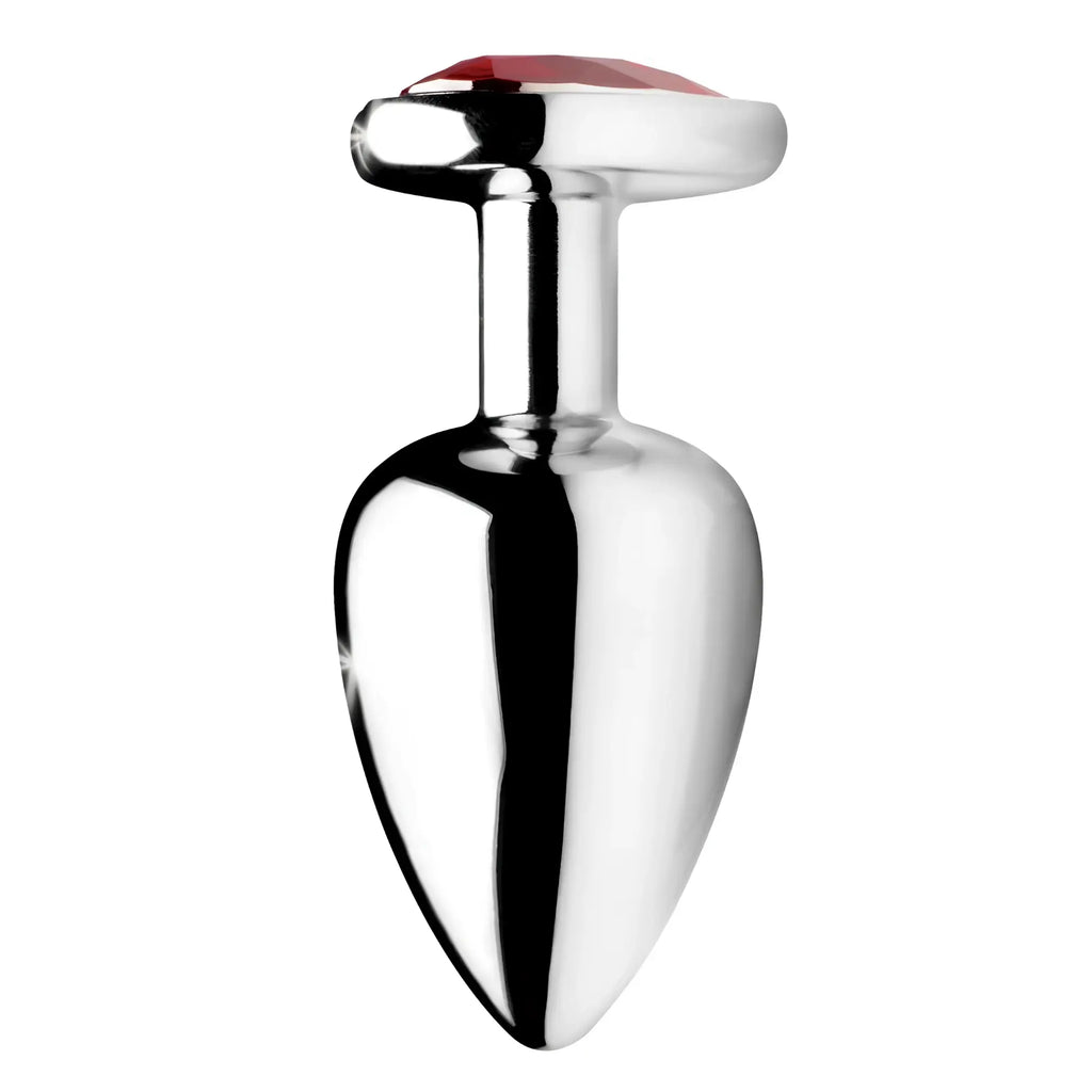 Booty Sparks anal plug featuring a silver, bulbous body and a top base set with a red heart-shaped gem.