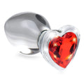 Booty Sparks glass anal plug with a smooth, reflective silver base and a sparkling, faceted red heart-shaped gem end.