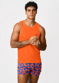 Orange sleeveless cotton tank top with a small circular logo on the left chest from BOTEQUIM CA-RIO-CA menswear