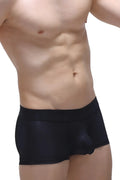 Black form-fitting boxer briefs with smooth glossy fabric and contoured design in boxer brief dome voile black