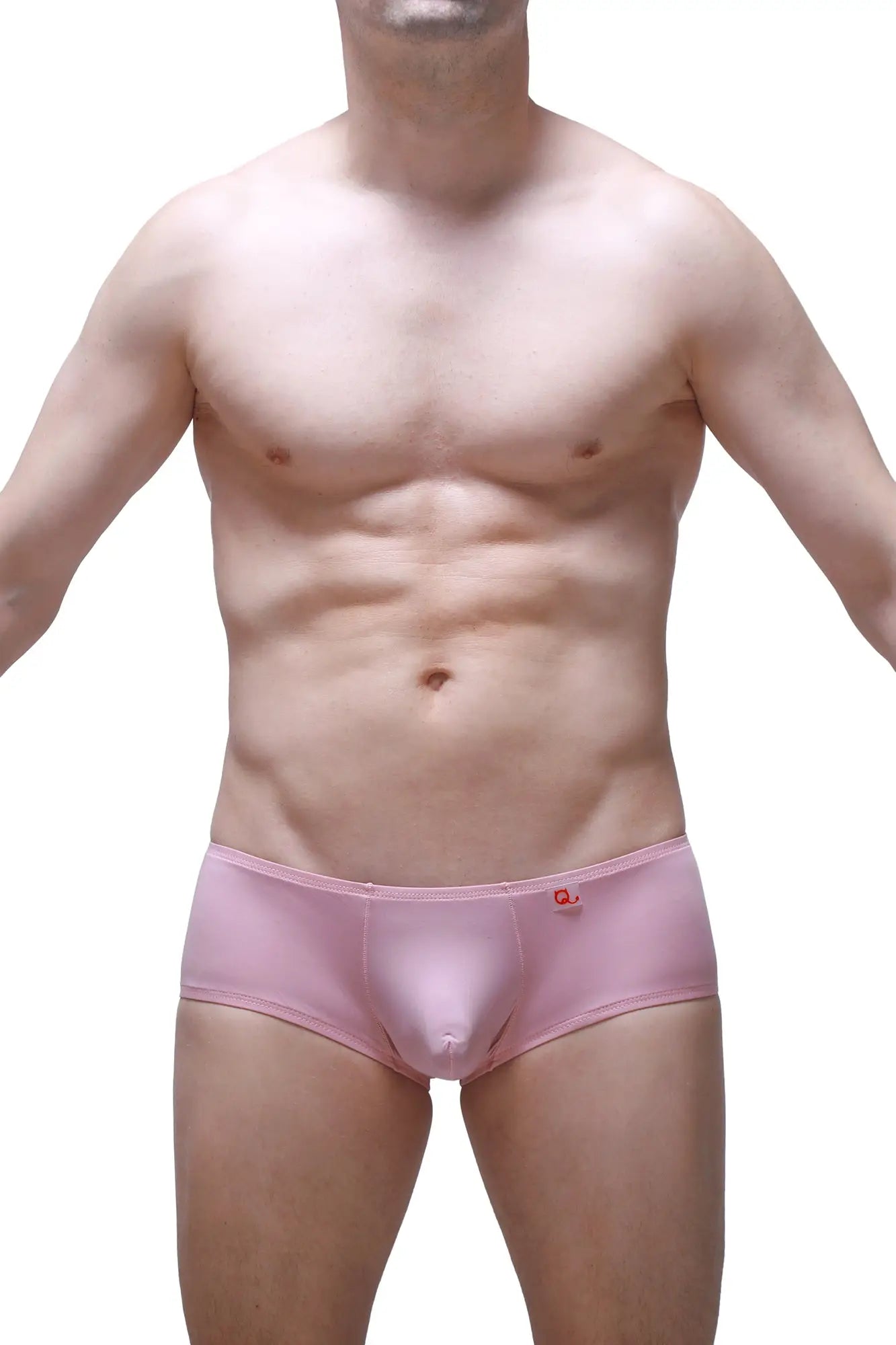 Pink men’s boxer briefs in tea rose with a small red logo on the waistband made from soft breathable fabric