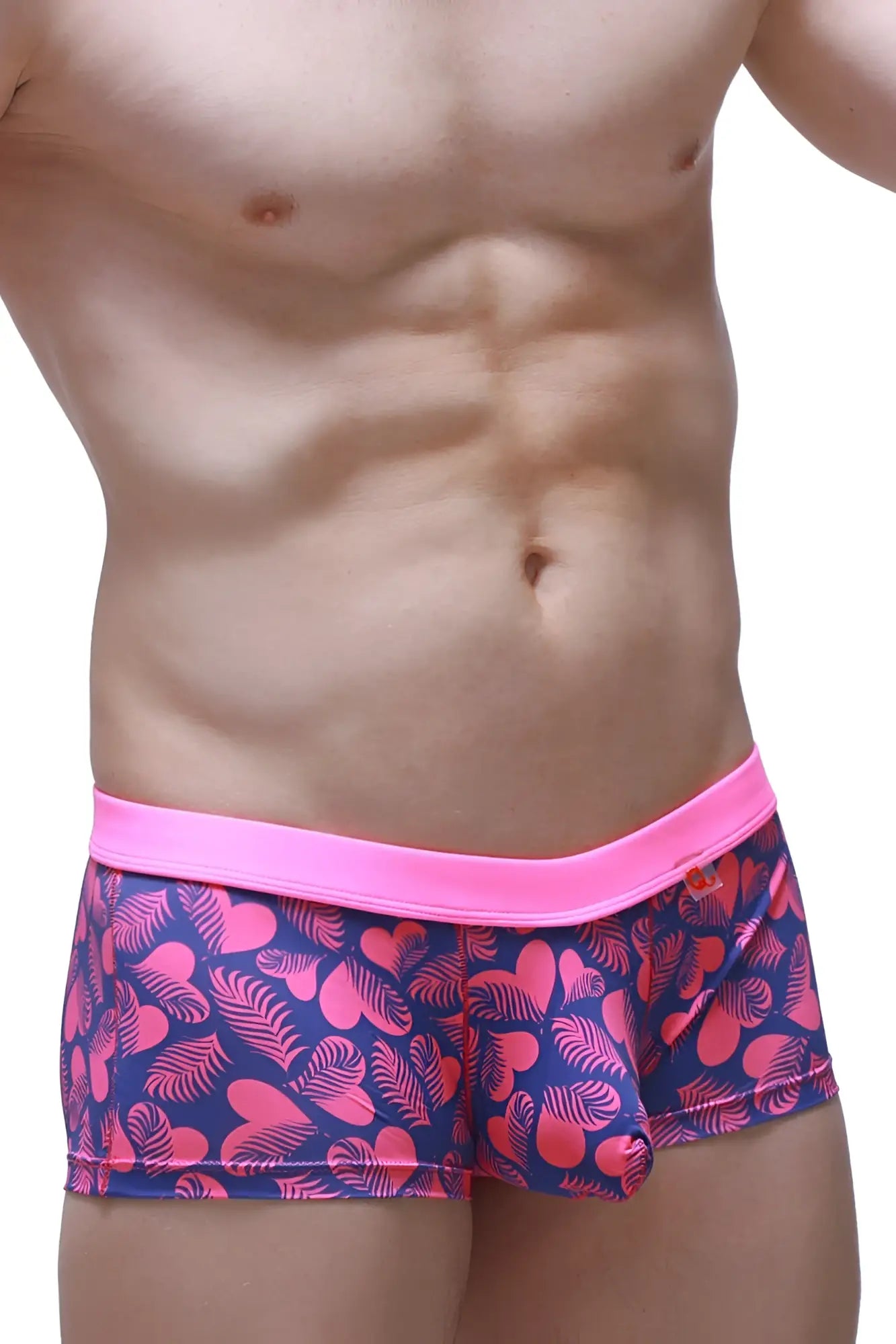 Boxer Meljac Tropical Hearts patterned swim trunks in pink and navy blue with a bright pink elastic waistband