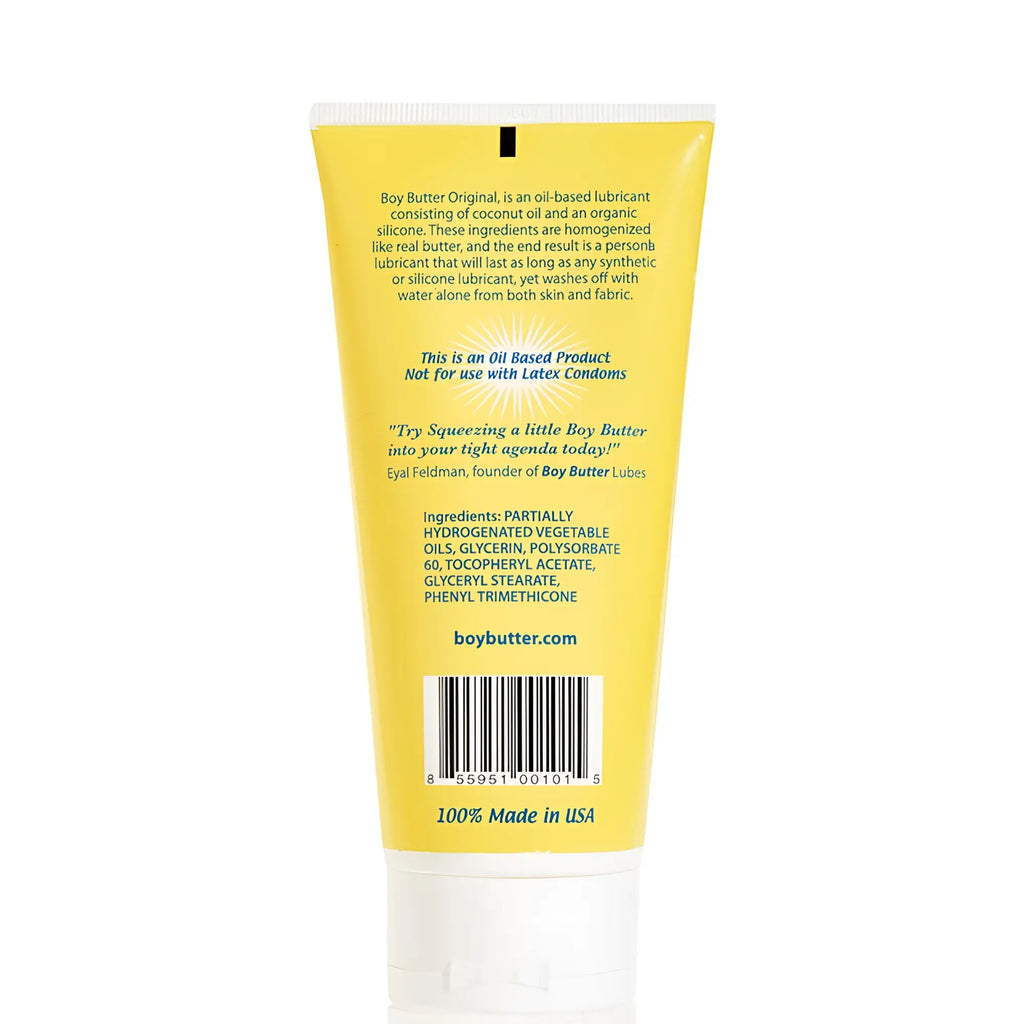 Bright yellow tube of boy butter original oil-based lubricant with white cap and black barcode shown from the back side