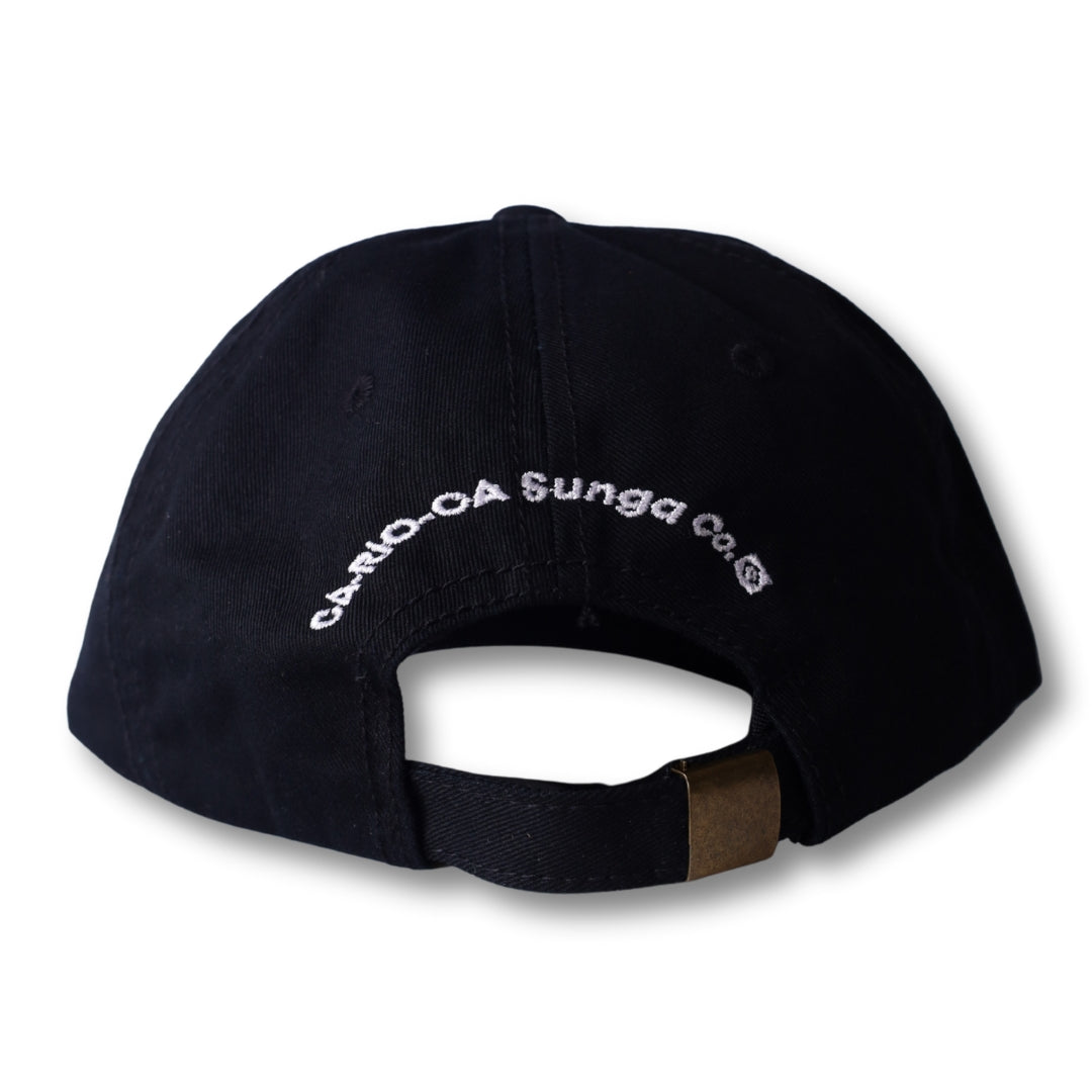 Back of black dad hat with white embroidered text and gold metal adjustment strap from boy from rio flip collection