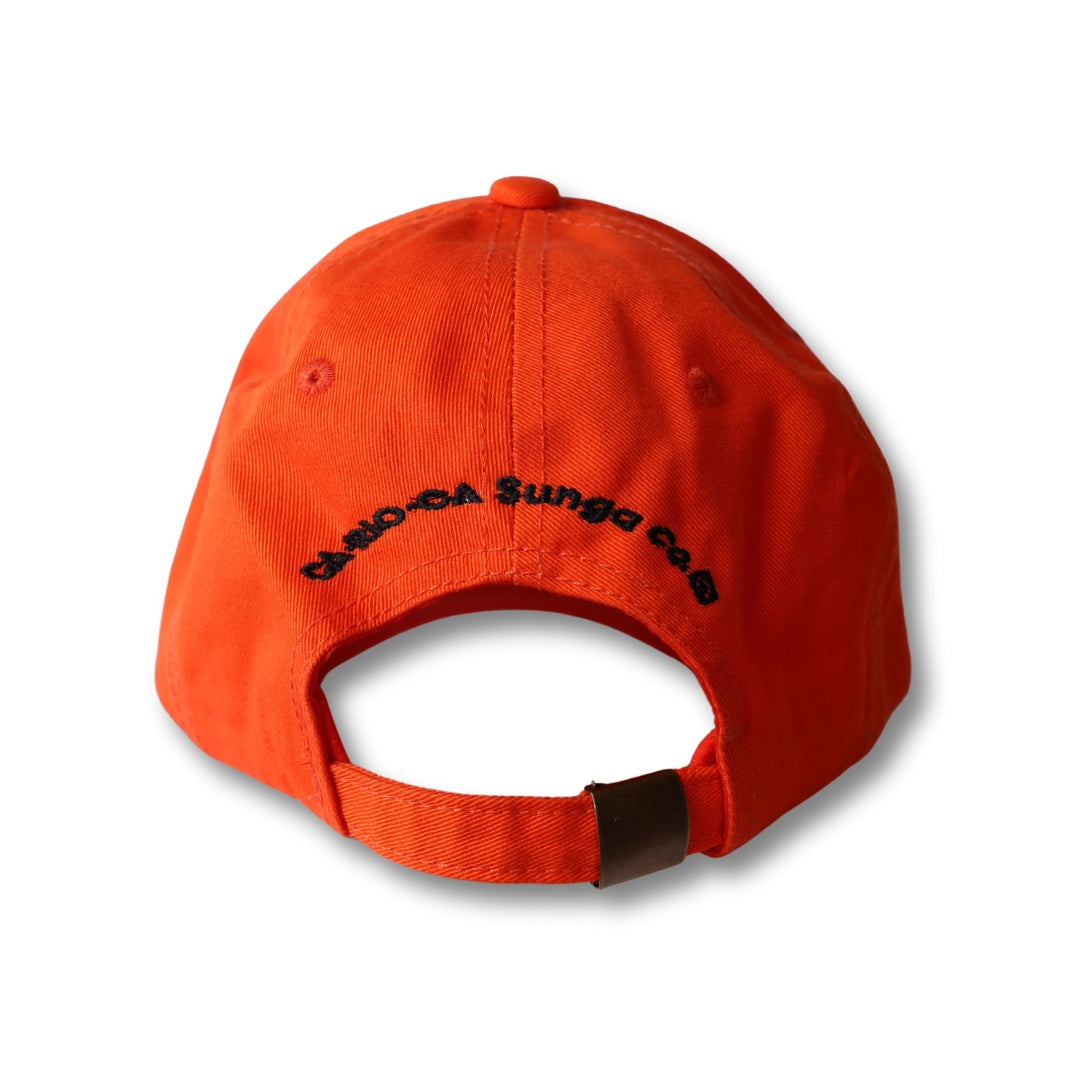 Bright orange dad hat boy from rio flip with black embroidered text on the back side of the cap