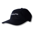 Black dad hat with white embroidered boy from text featuring a flip design from boy from rio collection