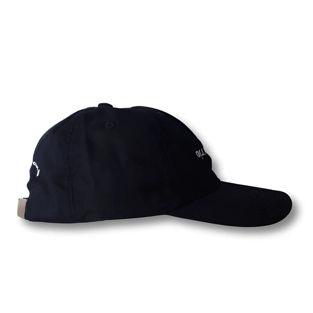 Black dad hat with white embroidered logo on the side from boy from rio flip collection