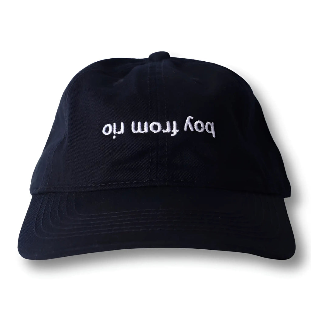 Black dad hat baseball cap with white embroidered bod from ori text from boy from rio flip collection