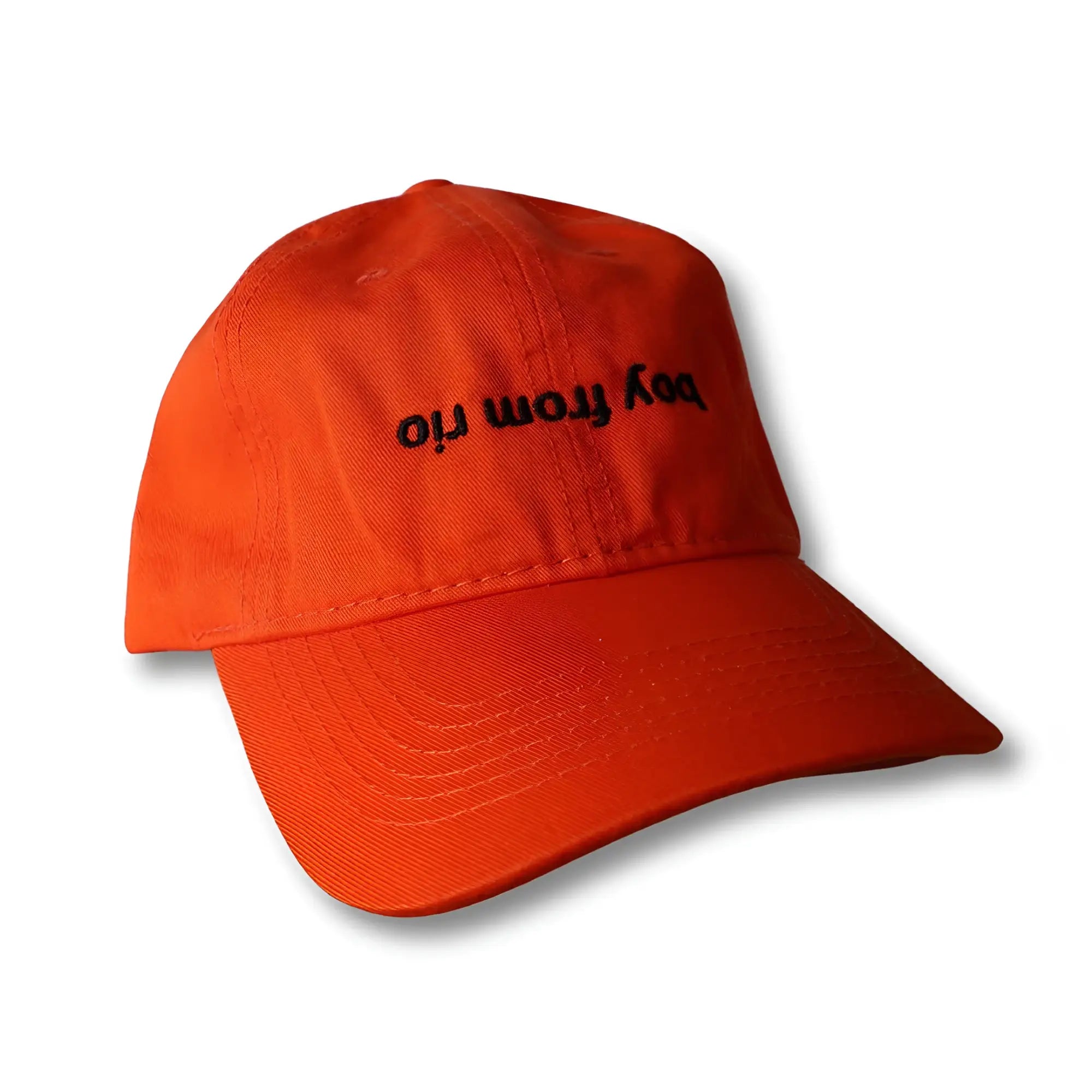 Orange dad hat with black embroidered boy from ori text featuring a flip design for casual wear