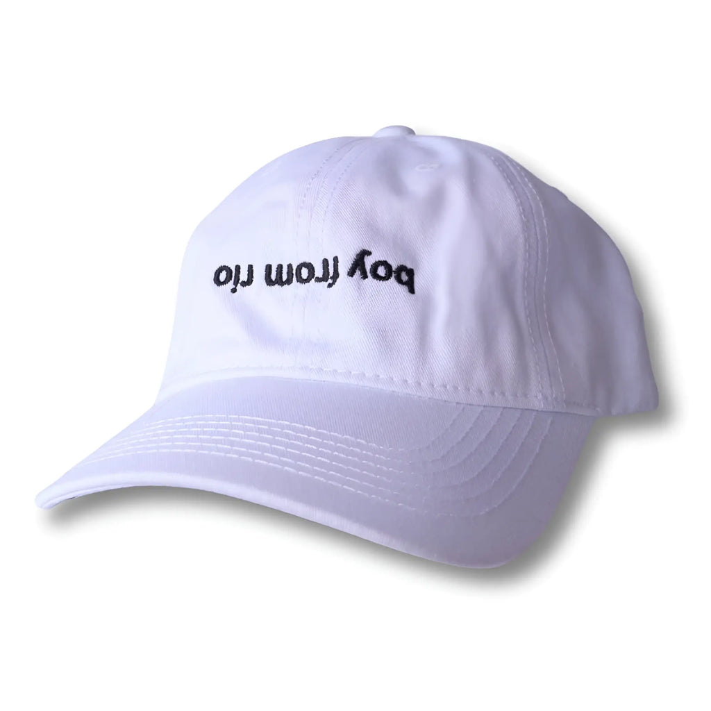 White dad hat with black embroidered boy from rio text front design casual baseball cap