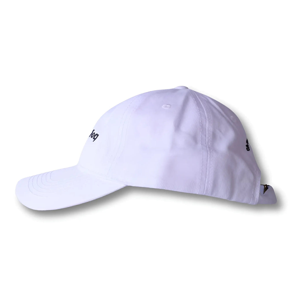 White dad hat with black embroidered text and logo featuring boy from rio flip design
