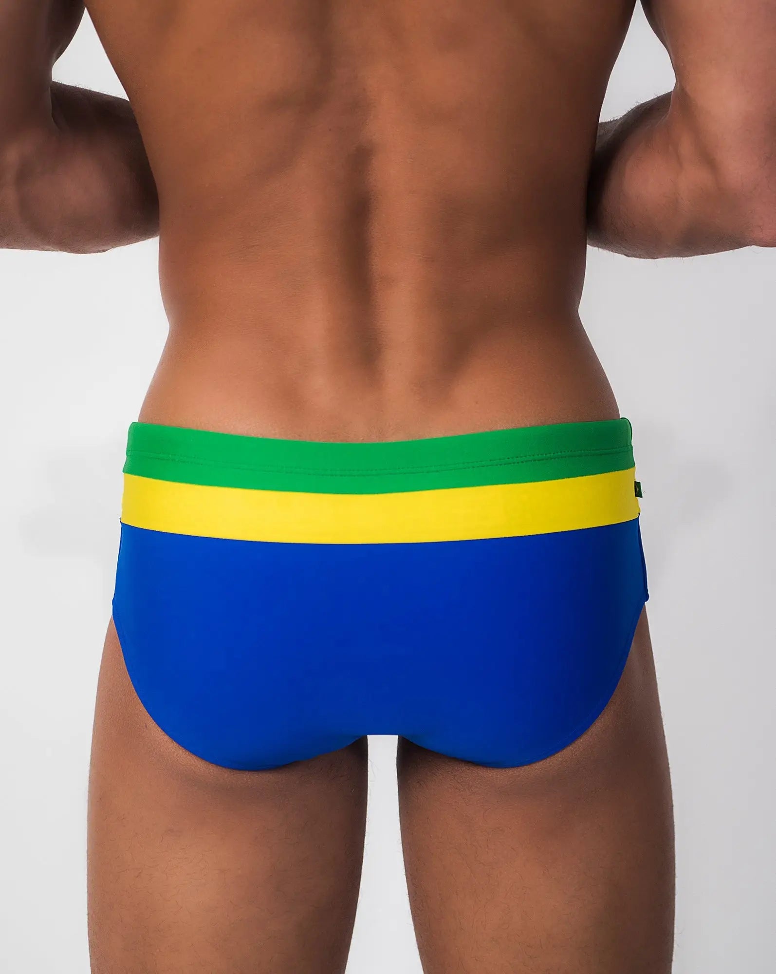 Blue Brasília Trio sunga swim trunks with a green and yellow striped waistband in classic traditional cut
