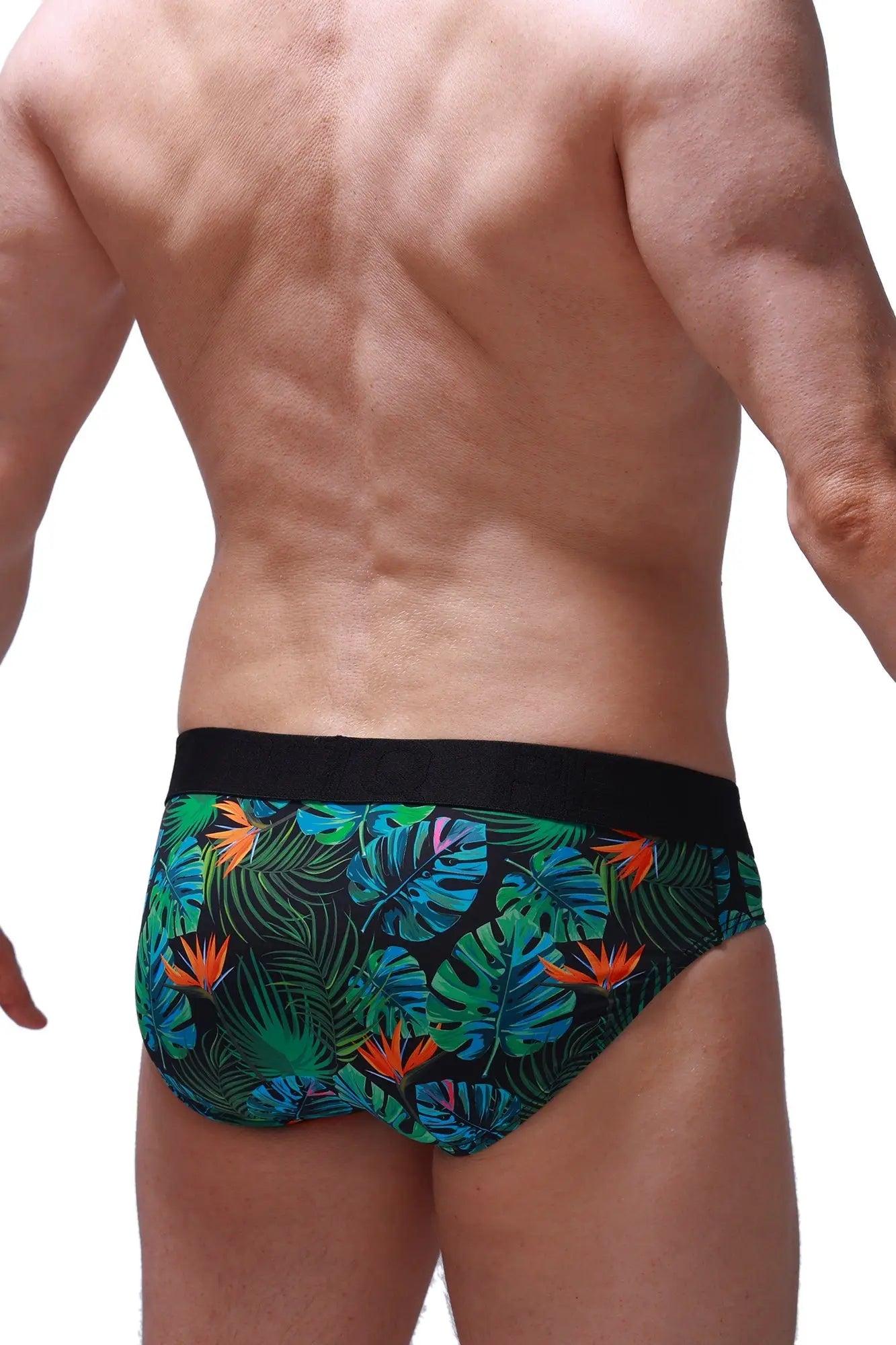 Brief chillax tropical swim trunks with tropical leaf and orange bird pattern and black waistband for casual beachwear