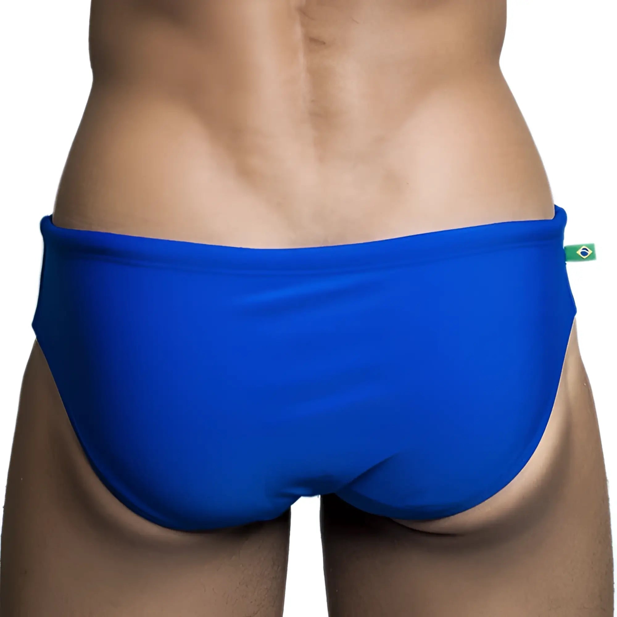 Brief cut solids sunga male bathing suit in bright blue with a green and yellow brazilian flag tag on the waistband