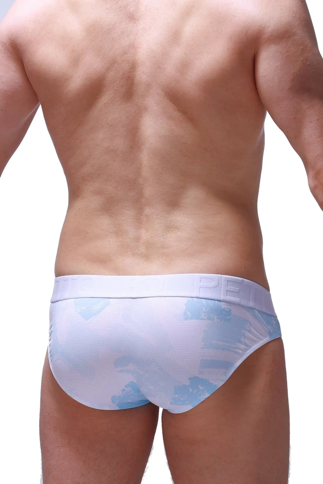 White briefs with light blue abstract brushstroke patterns and matching elastic waistband from brief mega bulge marbre sky blue collection