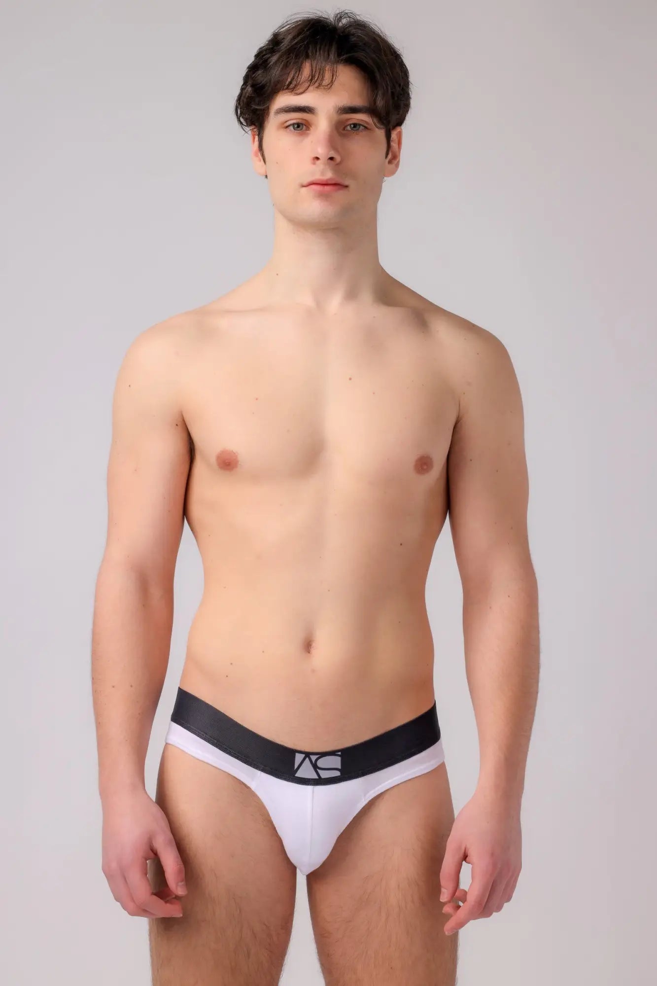 White briefs with a black waistband featuring a subtle logo from as me brief thong collection