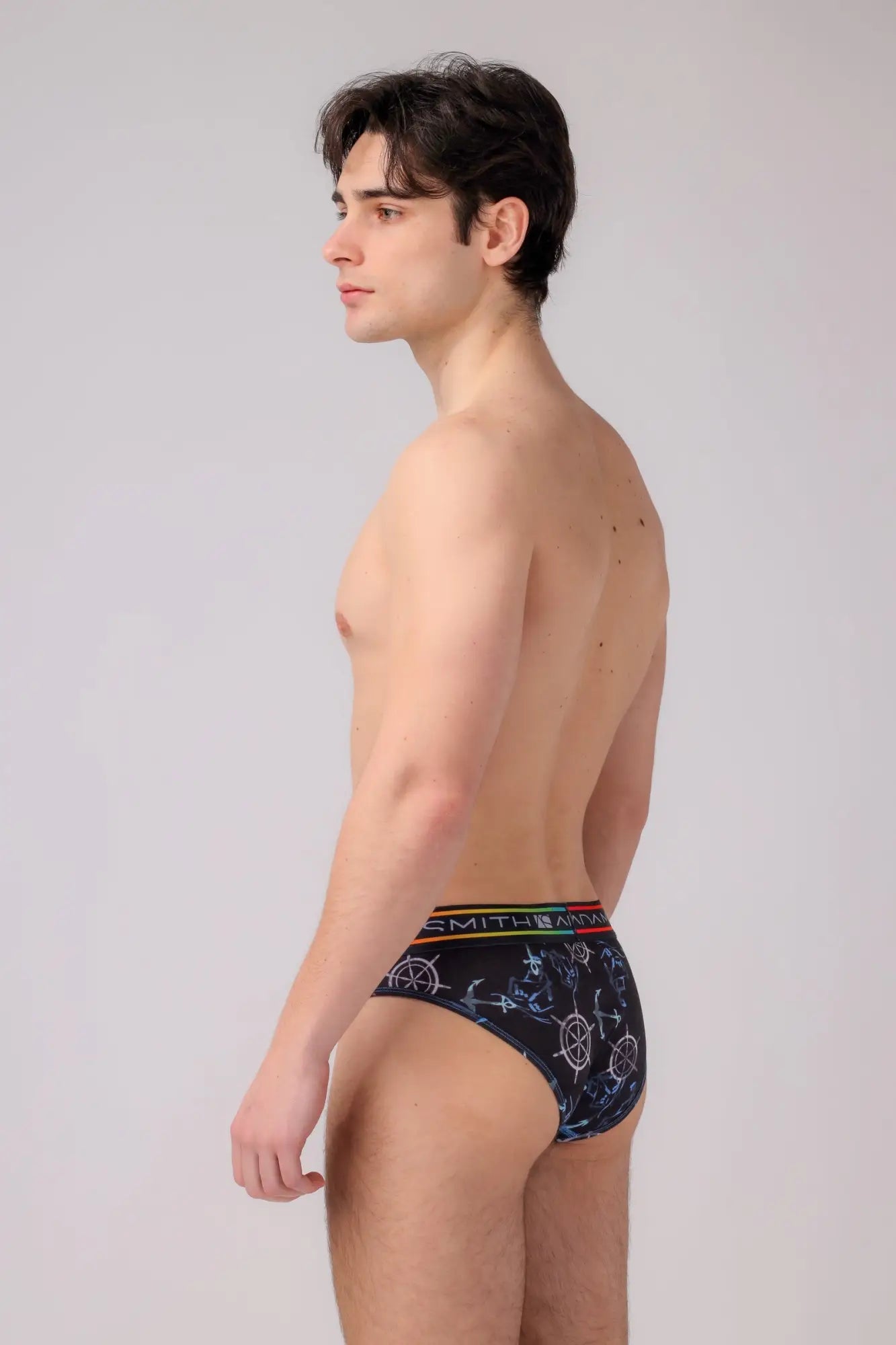 Black smith and main briefs in navy blue with white nautical anchors and ships wheels and a rainbow waistband