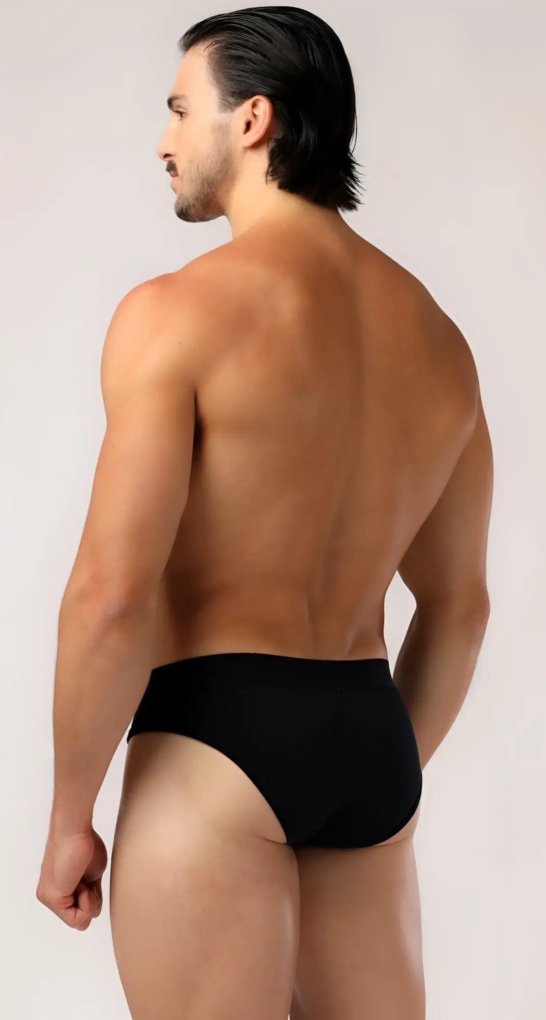 Black briefs with a smooth form-fitting design made from soft fabric for comfortable everyday wear