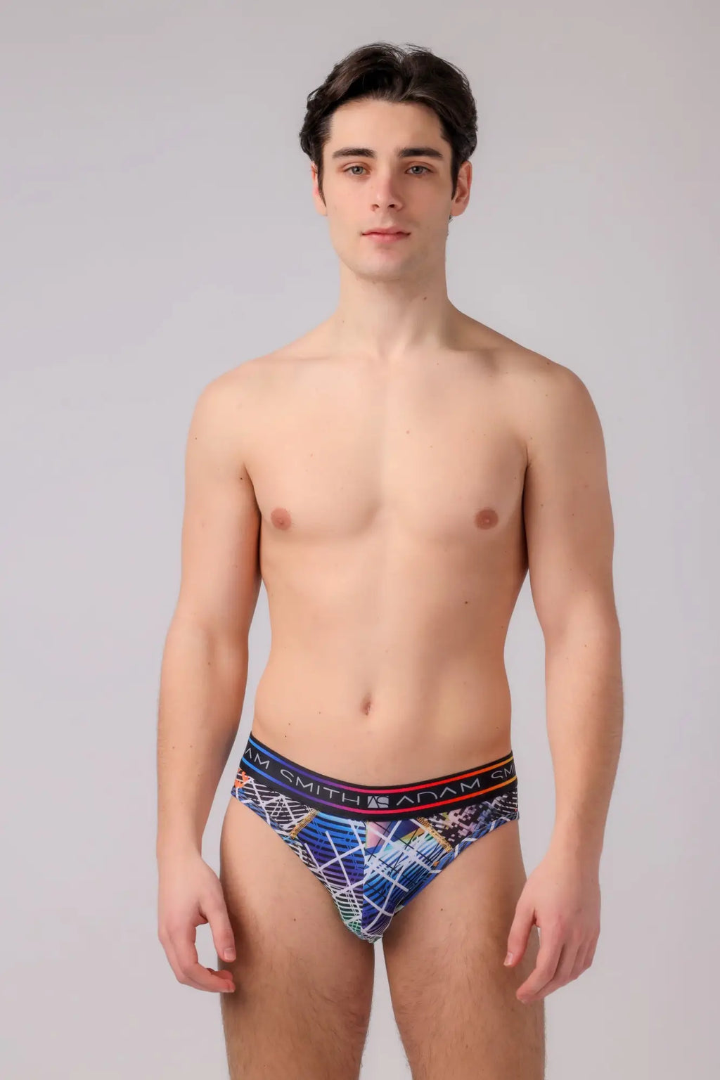 Briefs with blue and white patterns and a black elastic waistband branded adam smith for comfortable everyday wear