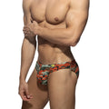 Bright camo swim brief in orange and green camouflage pattern with yellow logo on waistband swimming briefs