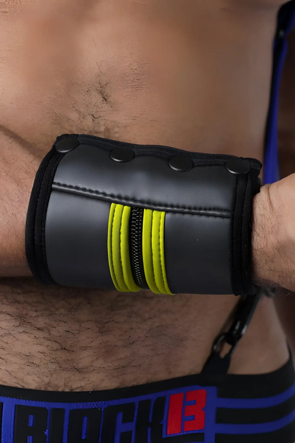 Black leather buckle up cuff wristband with three bright yellow stripes and zipper detail available in 5 colors