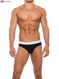 Black bulge enhancer bikini briefs with a white waistband by go softwear featuring a sleek minimalist design