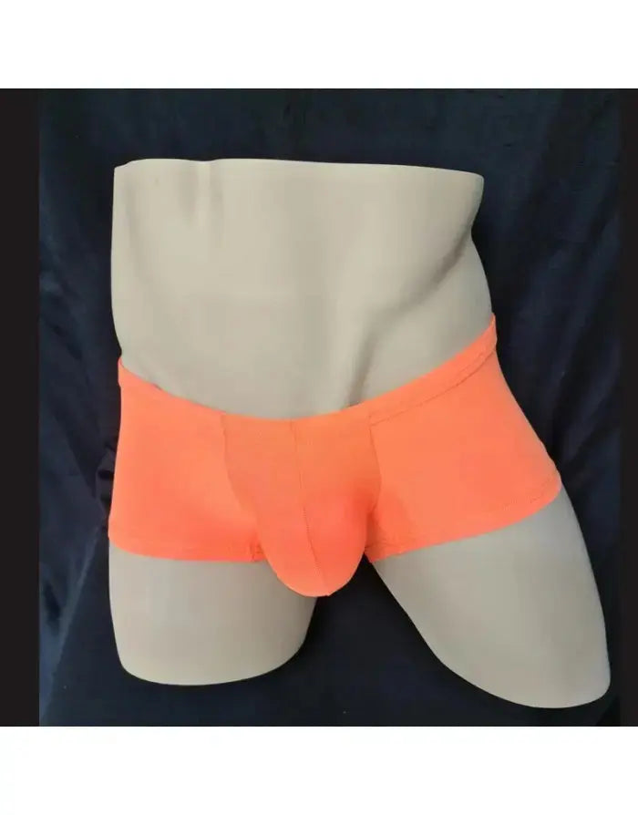 Orange boxer underwear displayed on a mannequin featuring a snug fit and soft material by Arroyman.