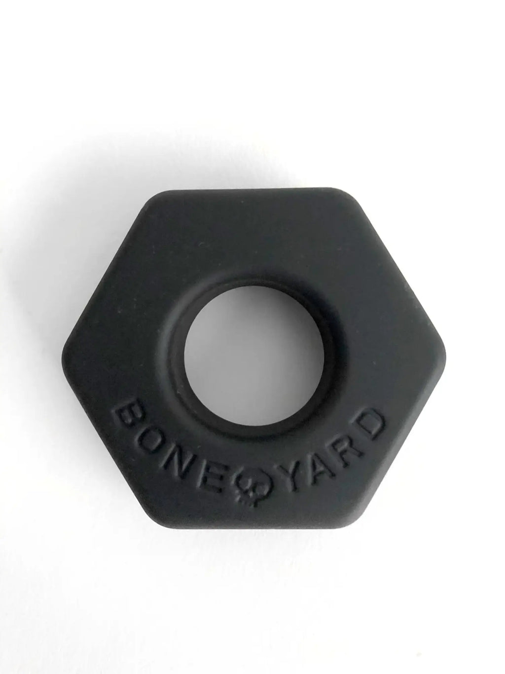Black hexagonal silicone ring bust a nut with bone yard embossed around the center for durable comfort wear