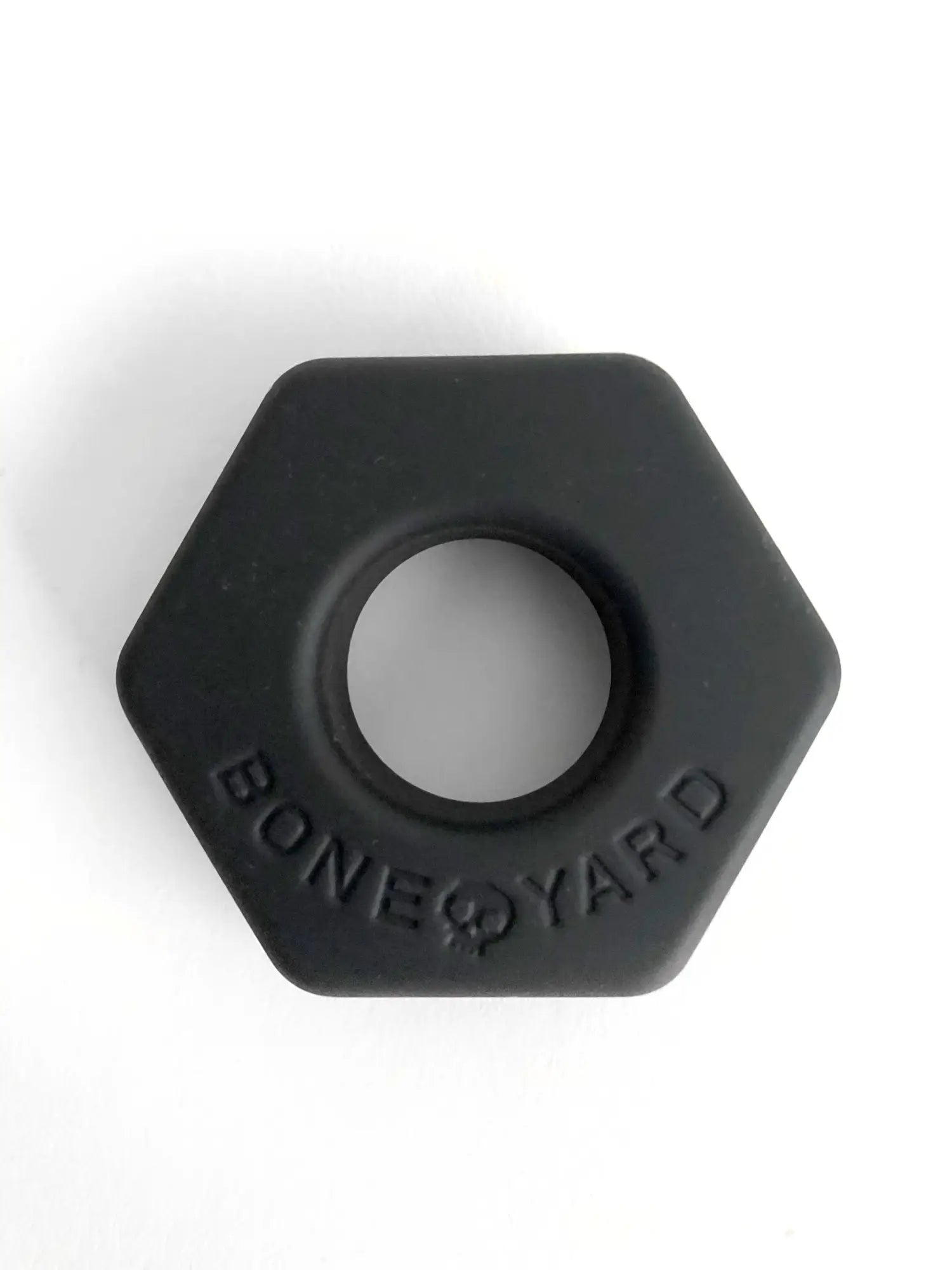 Black hexagonal silicone ring bust a nut with bone yard embossed around the center for durable comfort wear